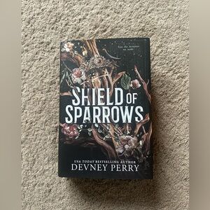 Shield of Sparrows by - Hardcover Book, Black Floral Cover